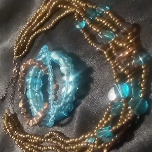 Metal beaded layered bronze and blue glass beaded twisted 16+4 in. Long